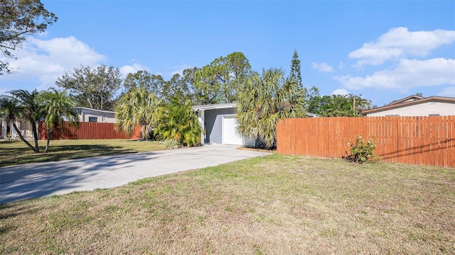 view of yard with a garage