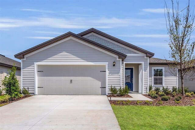 11 Prince Anthony Ln, Palm Coast, FL 32164 - ranch-style home featuring driveway, a garage, and a front lawn