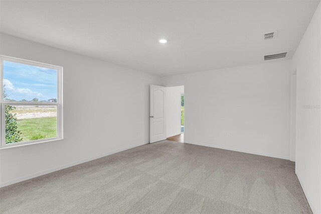 11 Prince Anthony Ln, Palm Coast, FL 32164 - empty room featuring carpet, recessed lighting, and baseboards