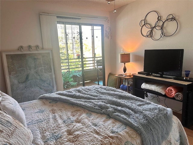 bedroom with access to outside