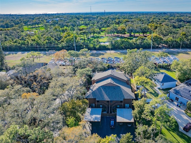 bird's eye view featuring a forest view