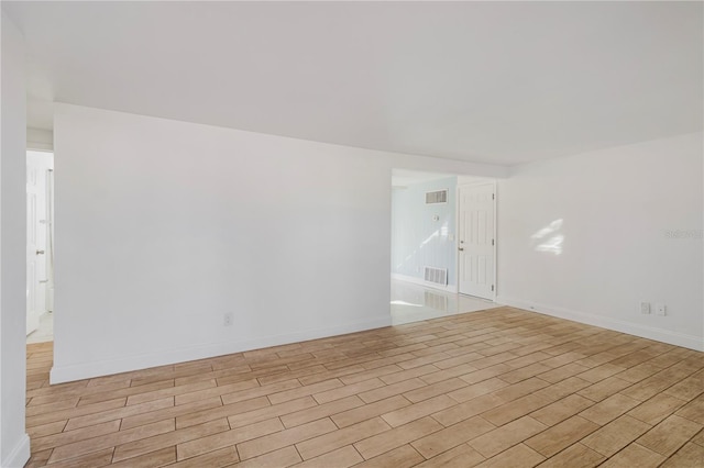 empty room featuring light hardwood / wood-style floors