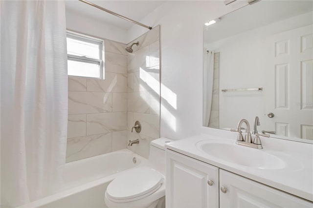 full bathroom featuring toilet, vanity, and shower / tub combo