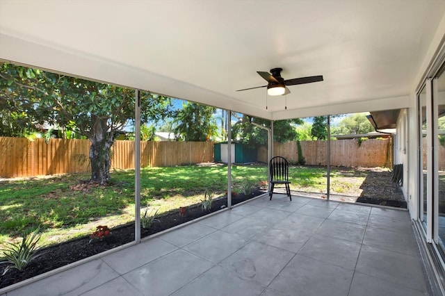 980 5th Ave NE, Largo, FL 33770 - unfurnished sunroom with a ceiling fan