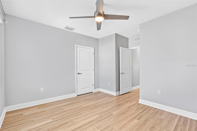 unfurnished bedroom with ceiling fan and light hardwood / wood-style flooring