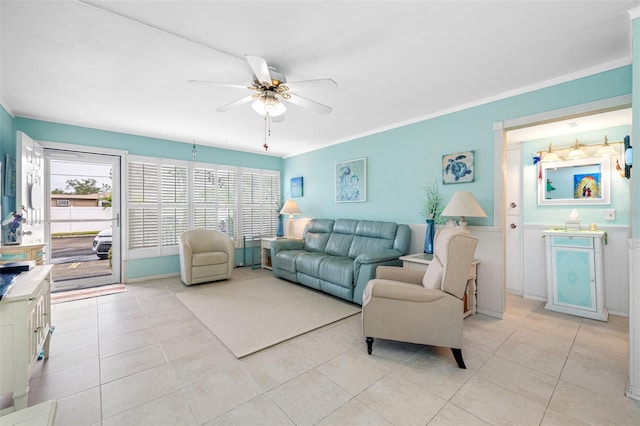 living room with ceiling fan and light tile patterned floors