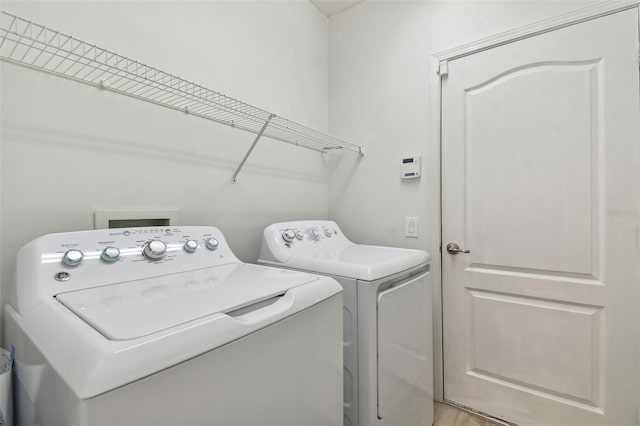 laundry area featuring washing machine and dryer