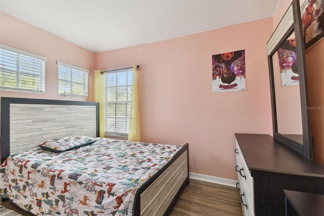 bedroom featuring dark hardwood / wood-style floors