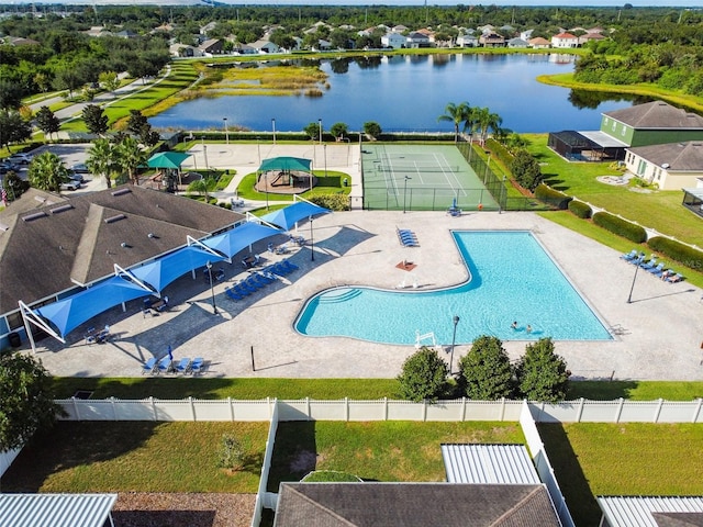 view of pool featuring a water view