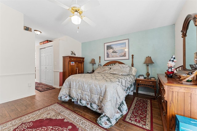 bedroom with ceiling fan, a closet, and hardwood / wood-style flooring