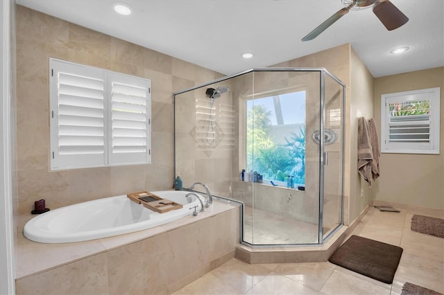 bathroom with separate shower and tub and tile patterned floors