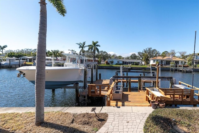 dock area with a water view