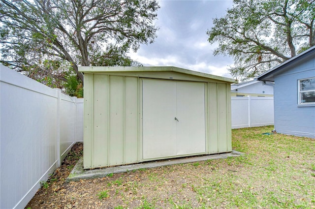 view of outdoor structure featuring a yard