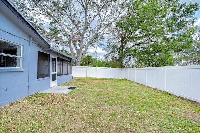 view of yard with a sunroom