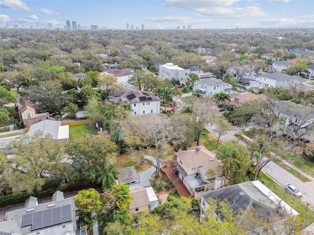 birds eye view of property with a residential view