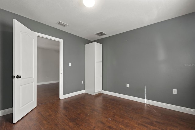 interior space featuring dark hardwood / wood-style flooring