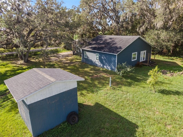 view of outdoor structure with a yard