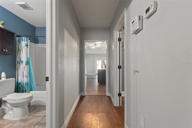 hall featuring light hardwood / wood-style floors