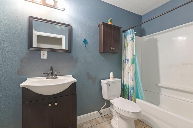 full bathroom with toilet, shower / tub combo, vanity, and tile patterned floors