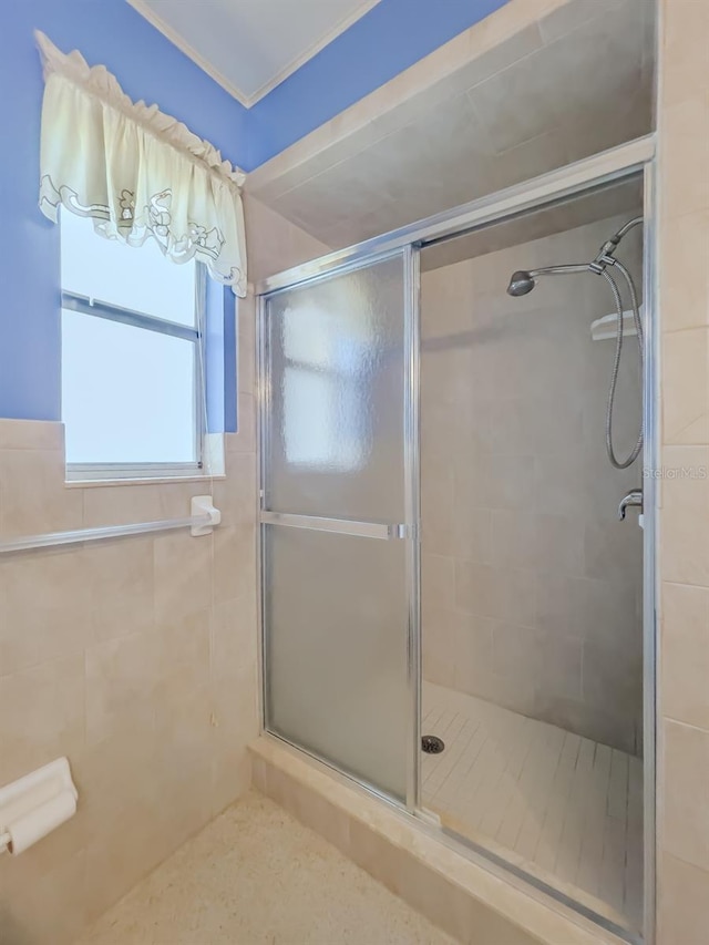 bathroom featuring an enclosed shower