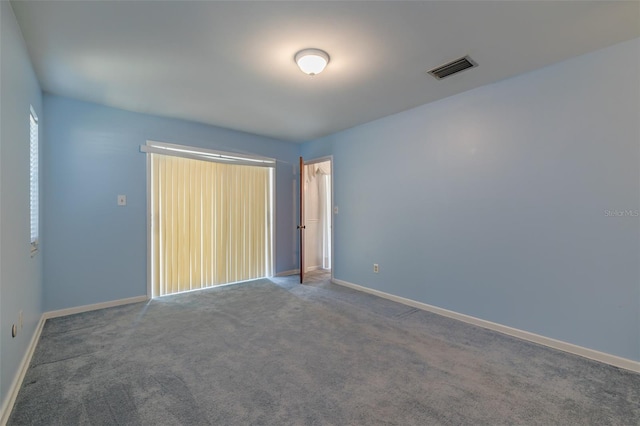 view of carpeted spare room