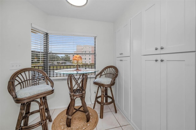 dining room with light tile patterned floors