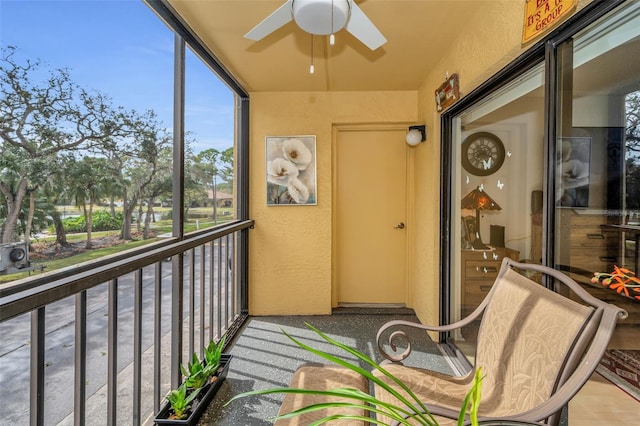 sunroom / solarium with ceiling fan