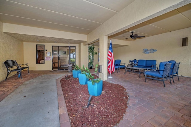 view of patio / terrace with a ceiling fan and an outdoor hangout area