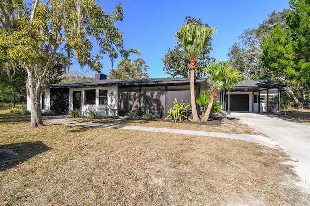 ranch-style house featuring a garage