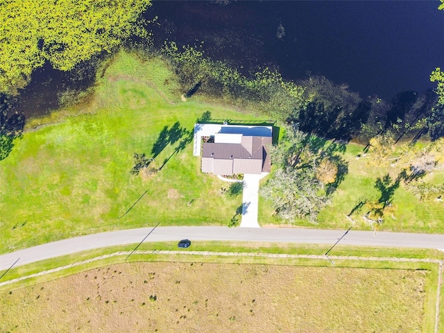 birds eye view of property with a rural view