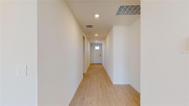 hallway featuring light hardwood / wood-style floors