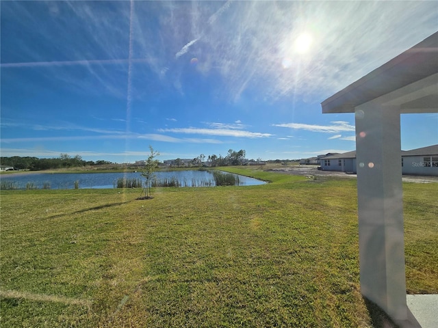 view of yard with a water view