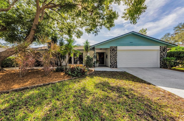 single story home with a garage