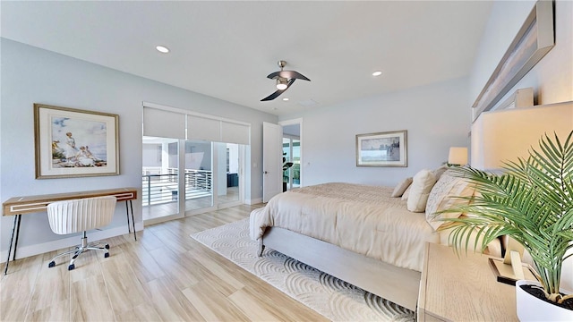 10101 Eagle Preserve Dr, Englewood, FL 34224 - bedroom featuring access to outside, ceiling fan, recessed lighting, and wood finished floors
