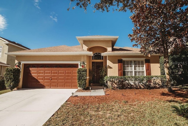 view of front of house with a garage