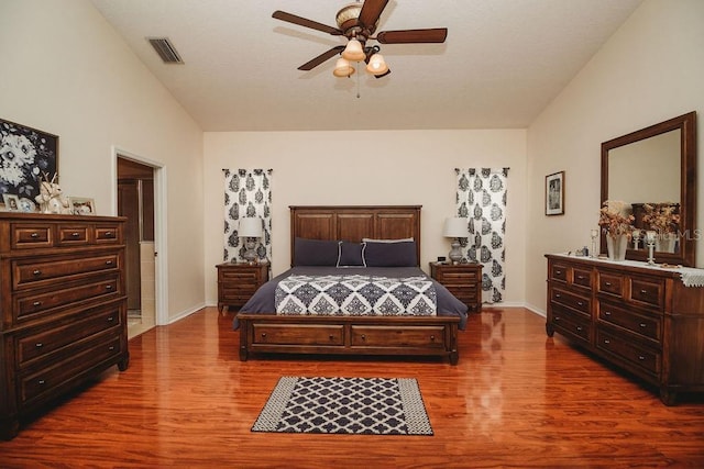 bedroom with ceiling fan and hardwood / wood-style floors