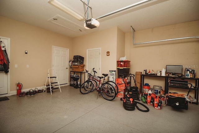 garage featuring a garage door opener