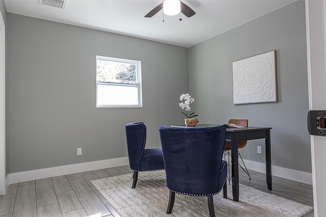 dining area featuring light hardwood / wood-style floors and ceiling fan