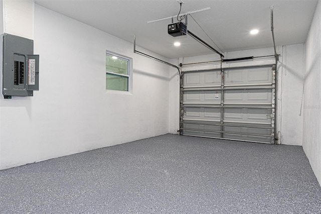 garage featuring a garage door opener and electric panel