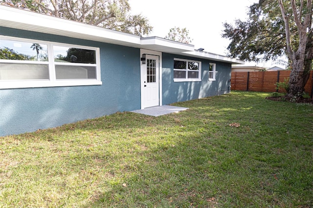 exterior space featuring a lawn