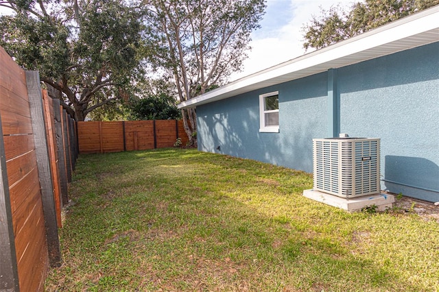 view of yard featuring central AC