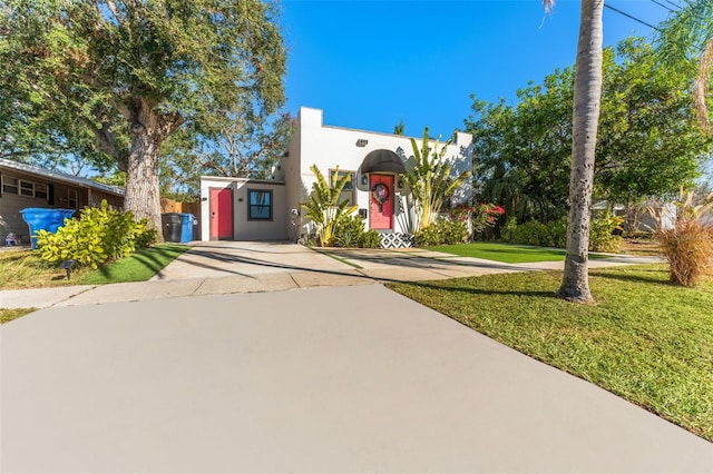 view of front facade with a front yard