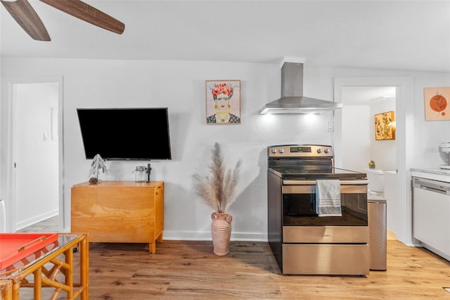 kitchen featuring stainless steel range with electric stovetop, wall chimney exhaust hood, ceiling fan, light hardwood / wood-style flooring, and dishwasher