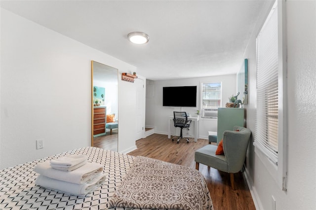 bedroom with light hardwood / wood-style flooring