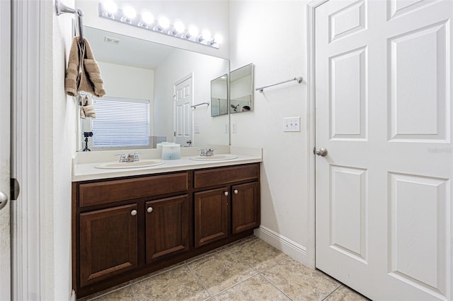 bathroom featuring vanity and tile patterned floors