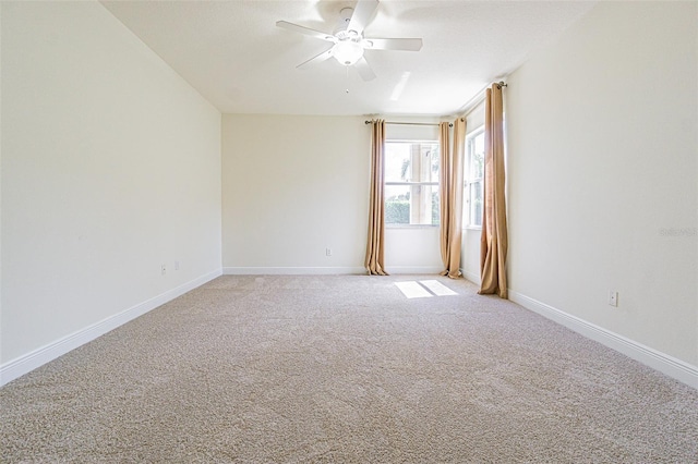 5709 White Trillium Loop, Land O Lakes, FL 34639 - unfurnished room with ceiling fan and light colored carpet