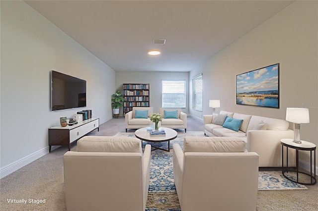 5709 White Trillium Loop, Land O Lakes, FL 34639 - living room with carpet flooring