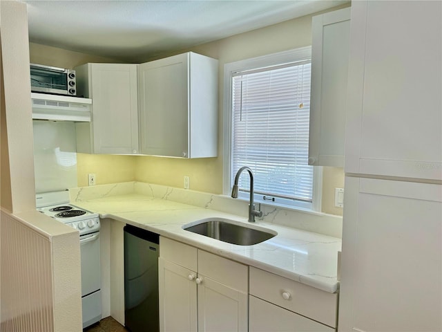 1003 Beverly Ave, Largo, FL 33770 - kitchen with white range with electric stovetop, ventilation hood, a sink, white cabinets, and light stone countertops