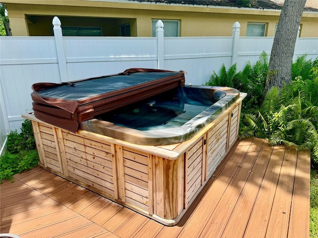 1003 Beverly Ave, Largo, FL 33770 - wooden terrace with a hot tub
