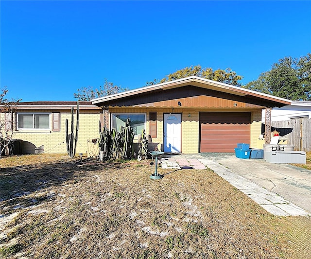 single story home featuring a garage